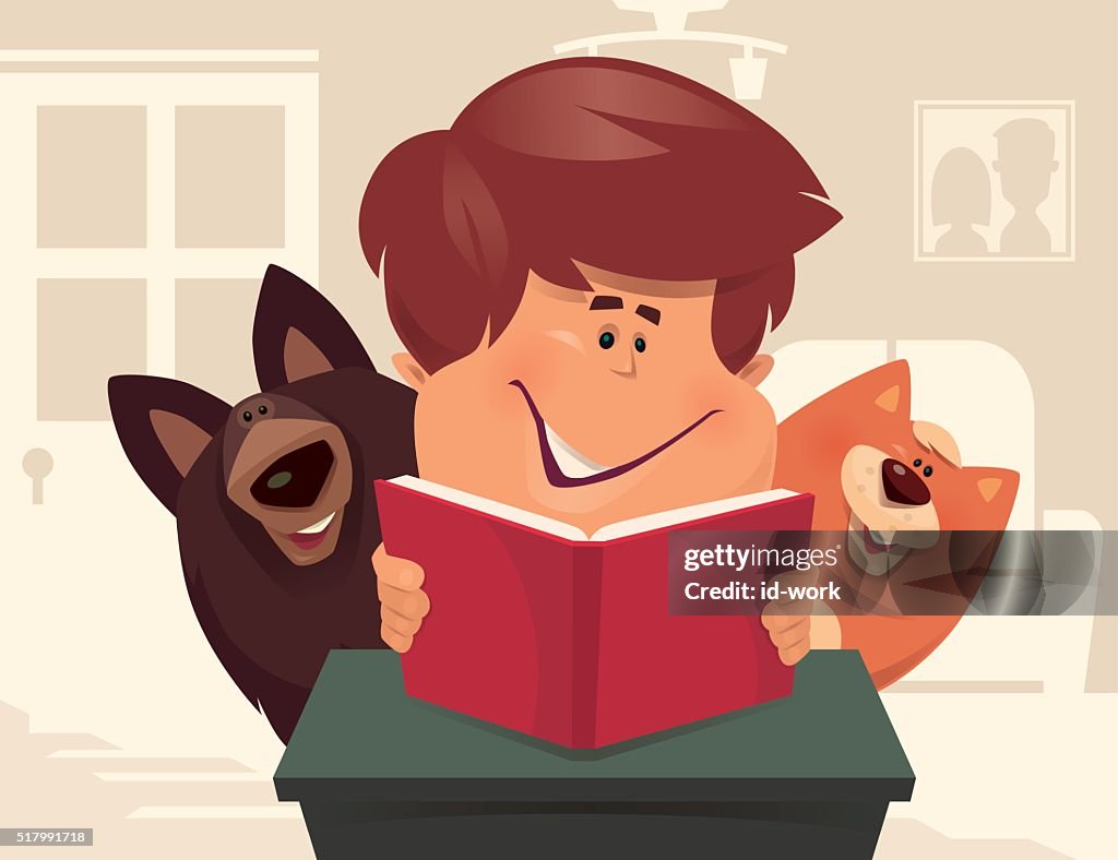 Kid reading with dog and cat