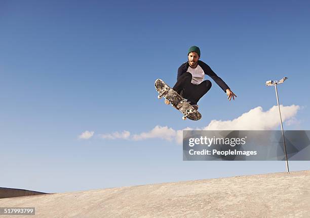 pulling off a sick trick - extreme skating stock pictures, royalty-free photos & images