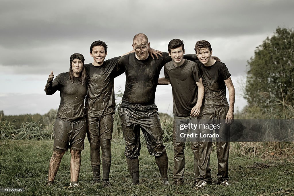 Family covered by dirt during mud run