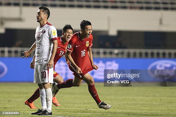 Huang Bowen of China celebrates after scoring his team's first goal during the FIFA 2018 World Cup Qualifier match between China and Qatar at Shaanxi...