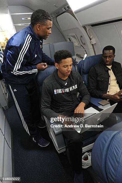 Anthony Brown and Brandon Bass of the Los Angeles Lakers watch film on the plane coming home after the game against the Phoenix Suns at Talking Stick...