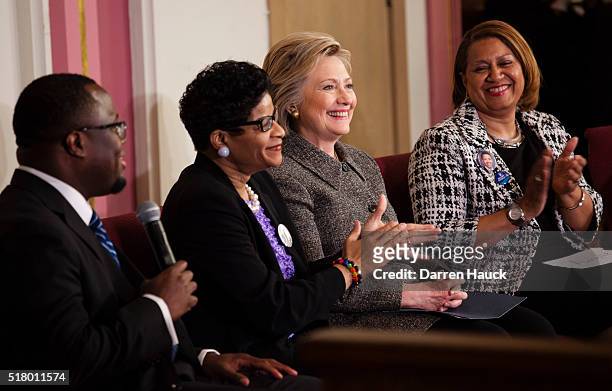 Democratic presidential candidate Hillary Clinton , Annette Holt , and Geneva Reed-Veal listen at a Community Forum on Gun Violence Prevention held...