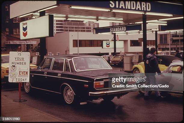 Oregon's Odd-Even Plan Reduced the Lines at Gas Stations During the Fuel Crisis in the Fall and Winter of 1973-74. This Station Was Servicing Cars...