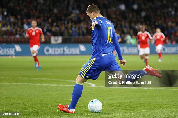 Edin Dzeko of Bosnia-Herzegovina scores his team's opening goal during the international friendly match between Switzerland and Bosnia-Herzegovina at...