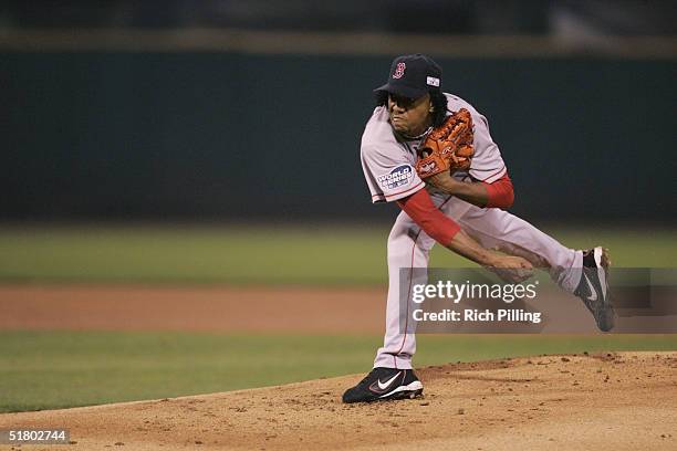 Pedro Martinez of the Boston Red Sox pitches during game three of the 2004 World Series against the St. Louis Cardinals at Busch Stadium on October...