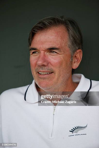 Executive Vice President of Baseball Operations Billy Beane of the Oakland Athletics relaxes in the dugout prior to a spring training game against...