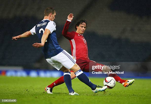 Steven Whittaker of Scotland vies with Thomas Delaney of Denmark during the International Friendly match between Scotland and Denmark at Hampden Park...