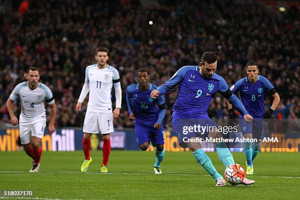 Vincent Janssen of the Netherlands scores his team's first goal from a penalty kick during the International Friendly match between England and the...