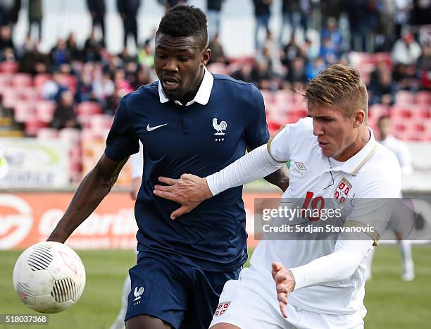 Marcus Thuram of France in action against Lyanco Vojnovic of Serbia during the UEFA European U19 Championship Elite Round Group 7 match between...
