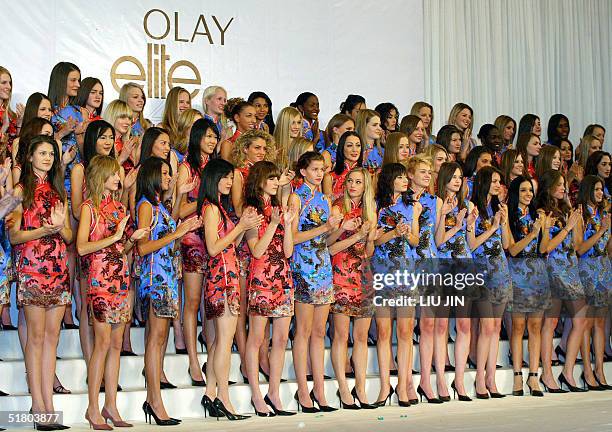 Contestants to the OLAY Elite Model Look 2004 International Finals are introduced during a press conference in Shanghai, 30 November 2004. The 80...