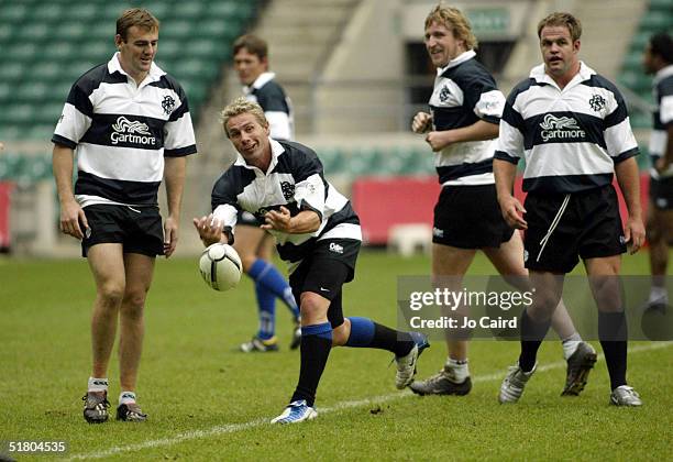 Chris Latham, Justin Marshall, Bill Young and Xavier Rush during a relaxed Barbarians training session at Twickenham Stadium on November 30, 2004 in...