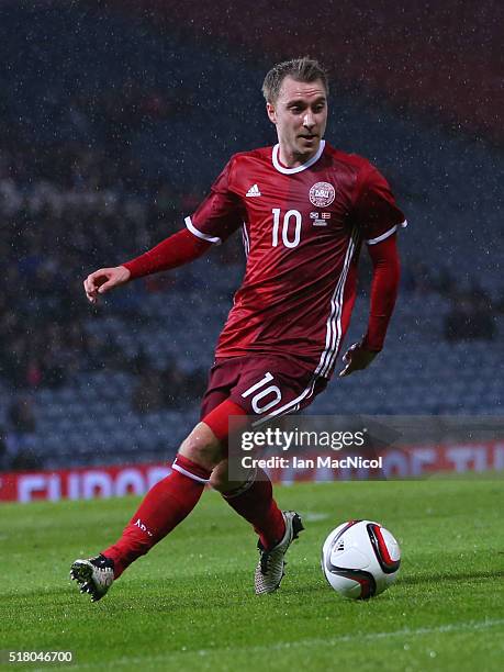 Christian Eriksen of Denmark controls the ball during the International Friendly match between Scotland and Denmark at Hampden Park on March 29, 2016...