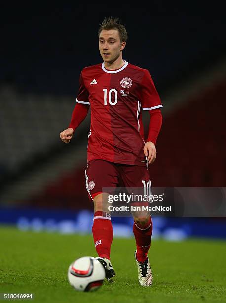 Christian Eriksen of Denma rkcontrols the ball during the International Friendly match between Scotland and Denmark at Hampden Park on March 29, 2016...