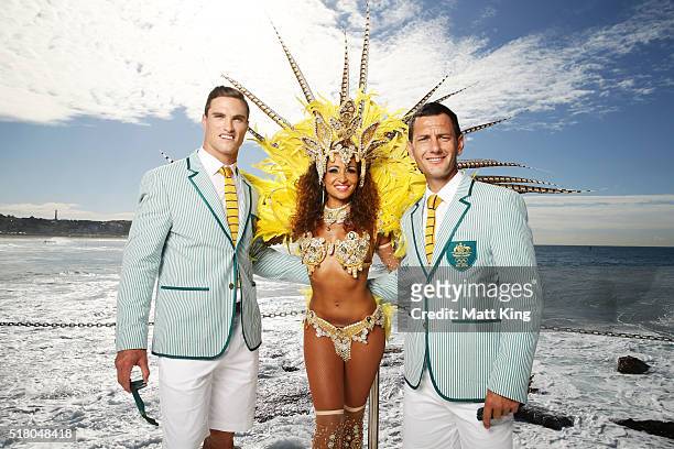 Australian athletes Ed Jenkins and Jamie Dwyer pose with a Brazilian dancer during the Australian Olympic Games Opening Ceremony Uniform Official...