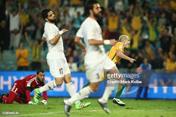 Aaron Mooy of Australia celebrates scoring a goal during the 2018 FIFA World Cup Qualification match between the Australian Socceroos and Jordan at...
