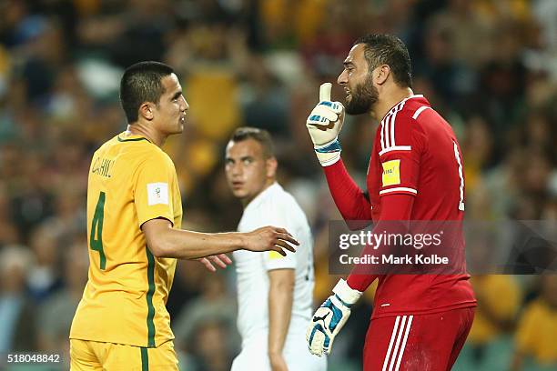 Tim Cahill looks on as Amer Shafi of Jordan shouts at his defenders during the 2018 FIFA World Cup Qualification match between the Australian...