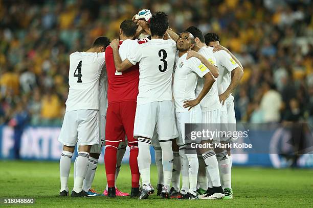 The Jordan team form a huddle before kick-off during the 2018 FIFA World Cup Qualification match between the Australian Socceroos and Jordan at...