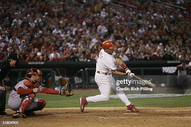 Albert Pujols of the St. Louis Cardinals bats during game three of the 2004 World Series against the Boston Red Sox at Busch Stadium on October 26,...