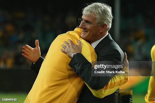 Tim Cahill of Australia embraces Steven Lowy the chairman of Football Federation Australia before kick-off in the 2018 FIFA World Cup Qualification...