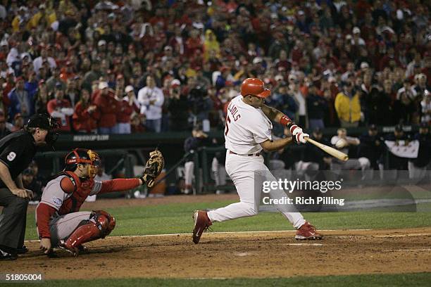 Albert Pujols of the St. Louis Cardinals bats during game three of the 2004 World Series against the Boston Red Sox at Busch Stadium on October 26,...