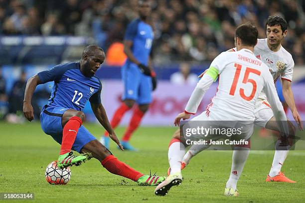 Lassana Diarra of France and Roman Shirokov of Russia in action during the international friendly match between France and Russia at Stade de France...