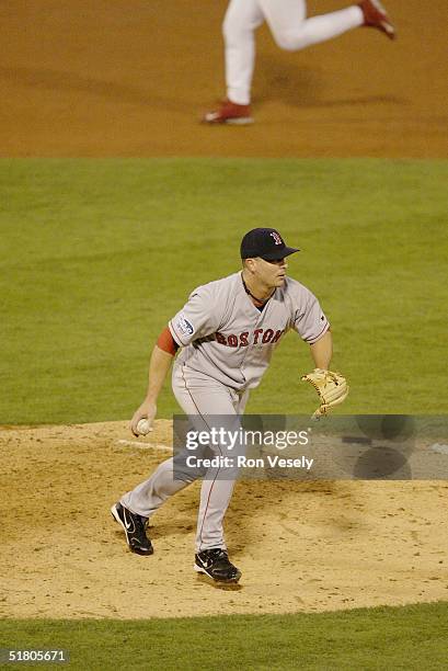 Pitcher Keith Foulke of the Boston Red Sox fields the last out of the game during game four of the 2004 World Series against the St. Louis Cardinals...