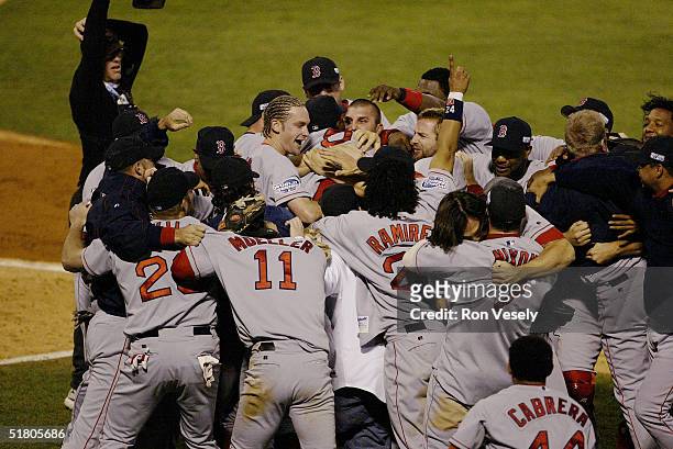 The Boston Red Sox celebrate after winning game four of the 2004 World Series against the St. Louis Cardinals at Busch Stadium on October 27, 2004 in...