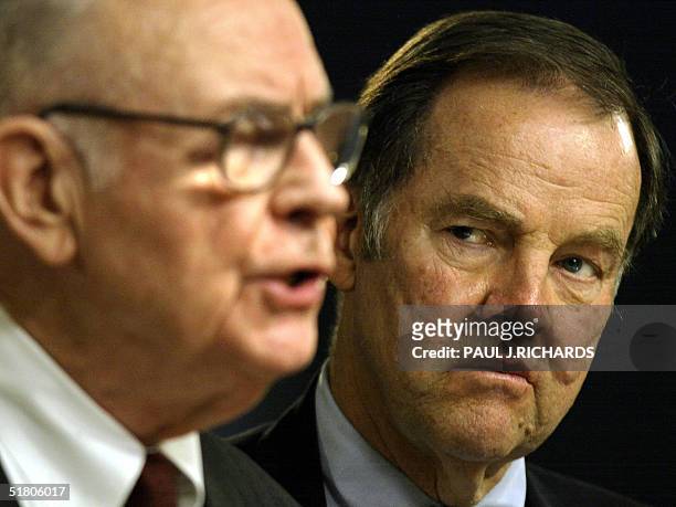 Lee Hamilton and and Thomas Kean , members of the blue-ribbon commission that investigated the 11 September 2001 terrorist attacks, address a press...