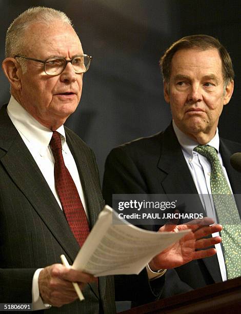 Lee Hamilton and and Thomas Kean , members of the blue-ribbon commission that investigated the 11 September 2001 terrorist attacks, address a press...