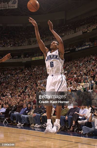 Howard Eisley of the Utah Jazz shoots against the Detroit Pistons on November 13, 2004 at the Delta Center in Salt Lake City, Utah. The Jazz won...