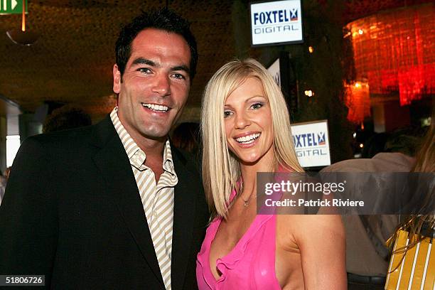 Presenters Peter Mason and Jodie Low attend the launch of the Summer season of Foxtel Digital at The Loft November 30, 2004 in Sydney, Australia.