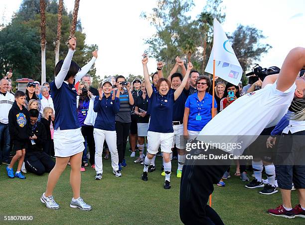 Shiho Oyama of Japan , Ayako Uehara of Japan and Yayoi Kobayashi of Japan football team celebrate as they sealed victroy as Abby Wambach of the...