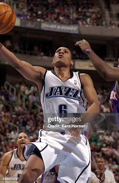 Howard Eisley of the Utah Jazz shoots against the Phoenix Suns on November 30, 2004 at the Delta Center in Salt Lake City, Utah. NOTE TO USER: User...