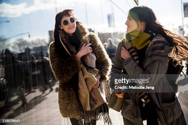 Models Liene Podina and Serena Archetti exit the Tibi show at Skylight 60 Tenth during New York Fashion Week: Women's Fall/Winter 2016 on February...