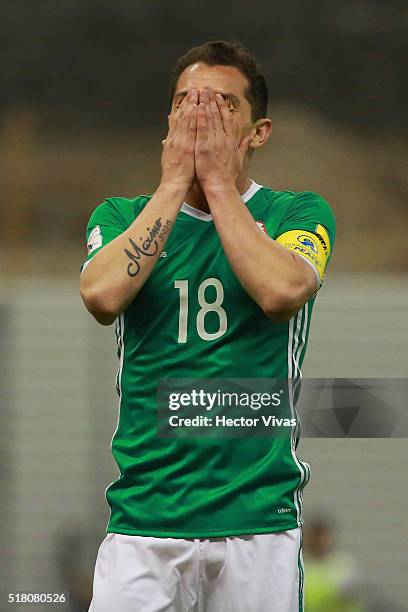 Andres Guardado of Mexico reacts during the match between Mexico and Canada as part of the FIFA 2018 World Cup Qualifiers at Azteca Stadium on March...