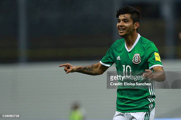 Jesus Corona of Mexico celebrates after scoring the second goal of his team during the match between Mexico and Canada as part of the FIFA 2018 World...