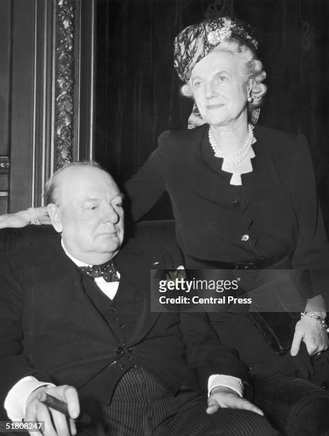 Former British Prime Minister Winston Churchill with his wife Clementine at a luncheon in his honour at the Metropolitan Club in New York, 15th March...