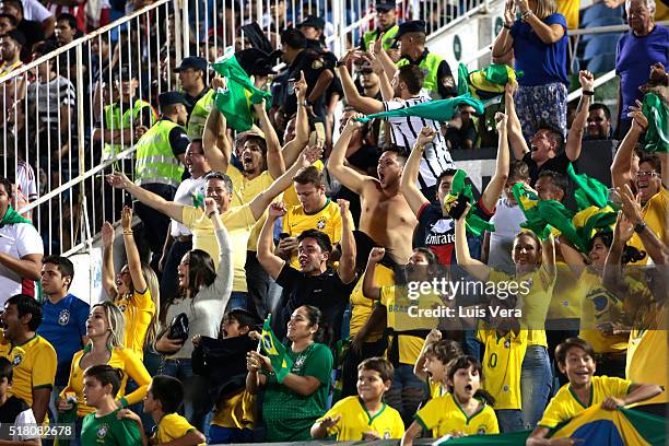 Fans of Brazil cheer for their team during a match between Paraguay and Brazil as part of FIFA 2018 World Cup Qualifiers at Defensores del Chaco...