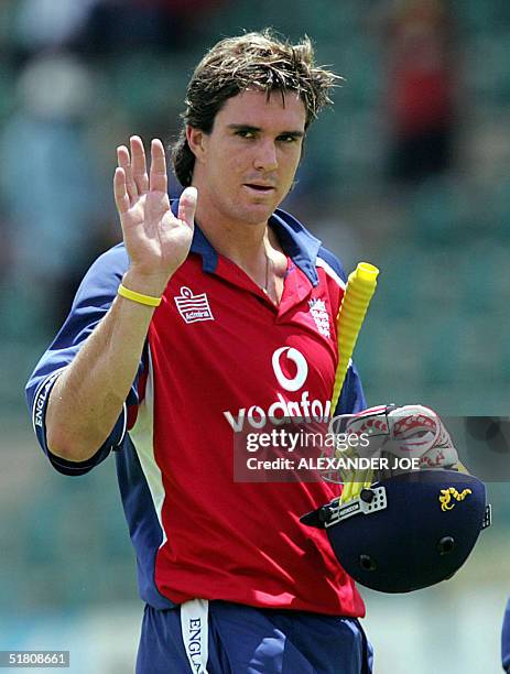 England's Kevin Pietersen celebrates after hitting a 6 against Zimbabwe during the second one-day test match in Harare, 01 December 2004. England...