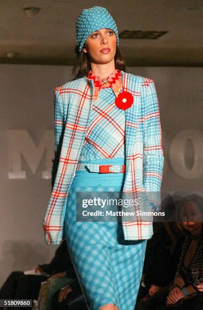 Model walks the runway at the Missoni Spring 2005 and Retrospective Fashion Show at Neiman Marcus on November 30, 2004 in Beverly Hills, California.