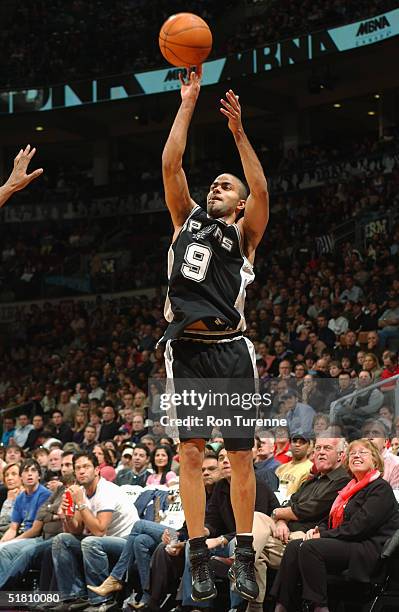 Tony Parker of the San Antonio Spurs shoots against the Toronto Raptors during the game on November 21, 2004 at the Air Canada Centre in Toronto,...