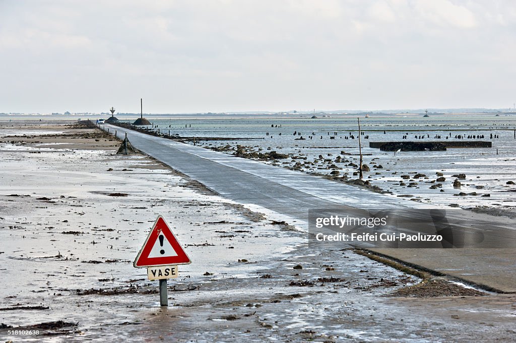 Warming Sign and Low tide of Passage du Gois of Vendée department in west part of France
