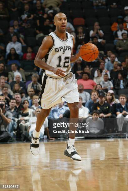 Bruce Bowen of the San Antonio Spurs moves the ball upcourt against the New York Knicks during the game at SBC Center on November 16, 2004 in San...