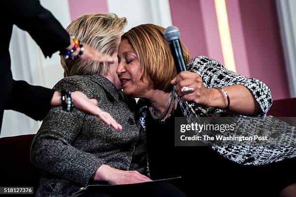 Former Secretary of State Hillary Clinton conducts a forum on preventing gun violence, with advocate Annette Holt, right, mother of Blair Holt who...