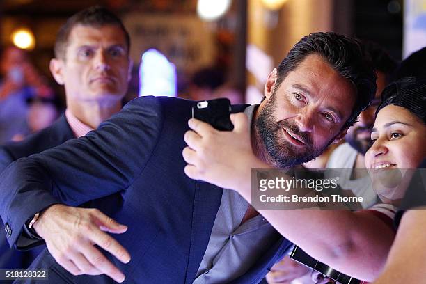 Hugh Jackman poses for a 'selfie' with fans ahead of the Eddie The Eagle screening at Event Cinemas Bondi Junction on March 30, 2016 in Sydney,...