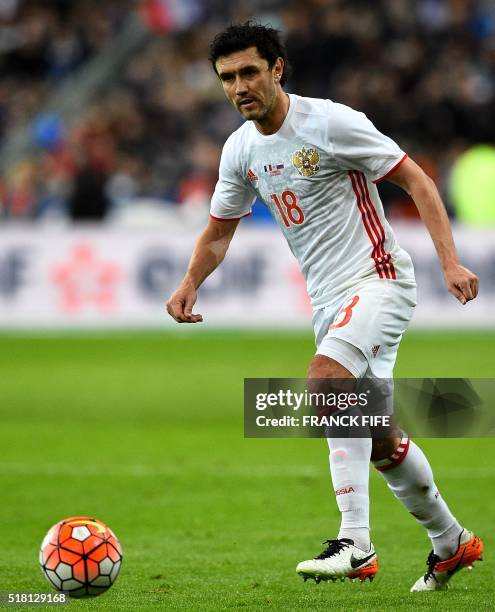 Russia's defender Yury Zhirkov controls the ball during the international friendly football match between France and Russia at the Stade de France in...