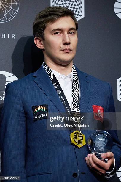 Russian grand-master and winner Sergei Karjakin attends the World Chess closing ceremony at at the DI Telegraph on March 29, 2016 in Moscow, Russia.