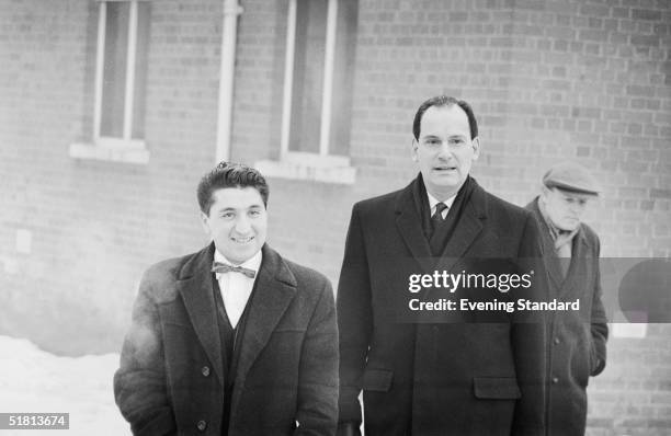 Freelance photographer Ray Bellisario with his solicitor David Jacobs, 24th January 1963, after a court summons was issued against Bellisario for...