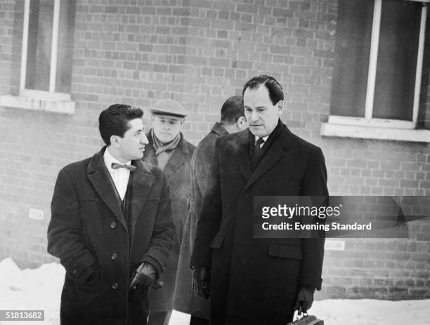 Freelance photographer Ray Bellisario with his solicitor David Jacobs, 24th January 1963, after a court summons was issued against Bellisario for...