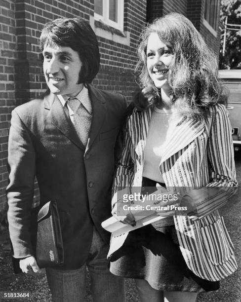 Photographer Ray Bellisario and his fiance Annie Collins outside Haywards Heath Magistrates Court, 9th September 1971. Bellisario is bringing a...